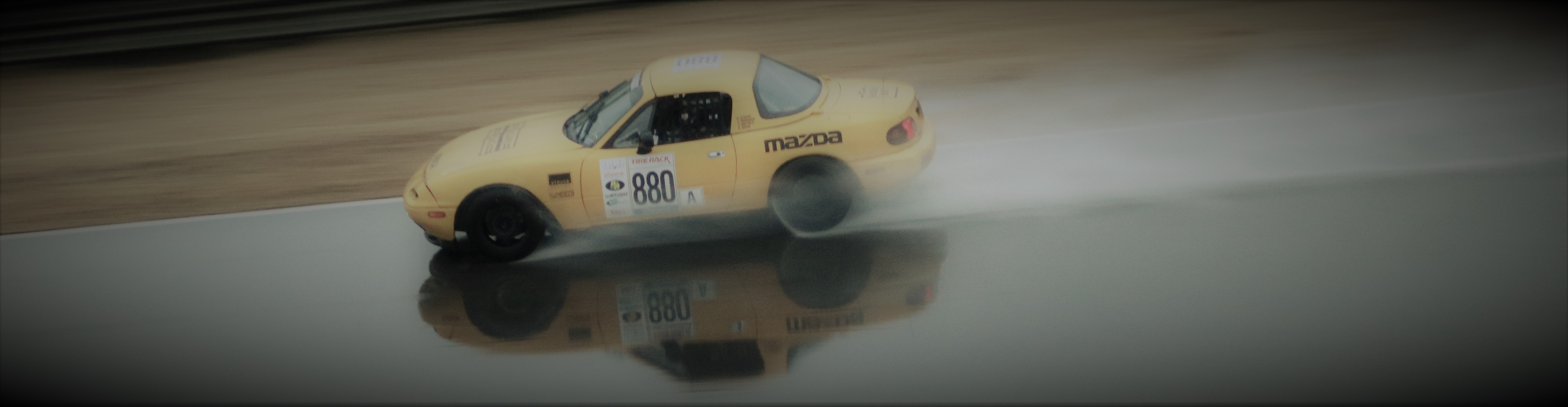 Mazda Miata racing at Barber Motorsports Park